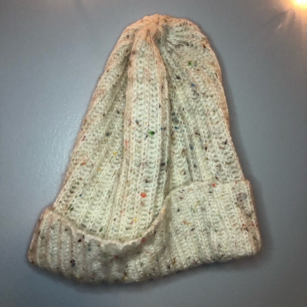 white and multi-colored beanie